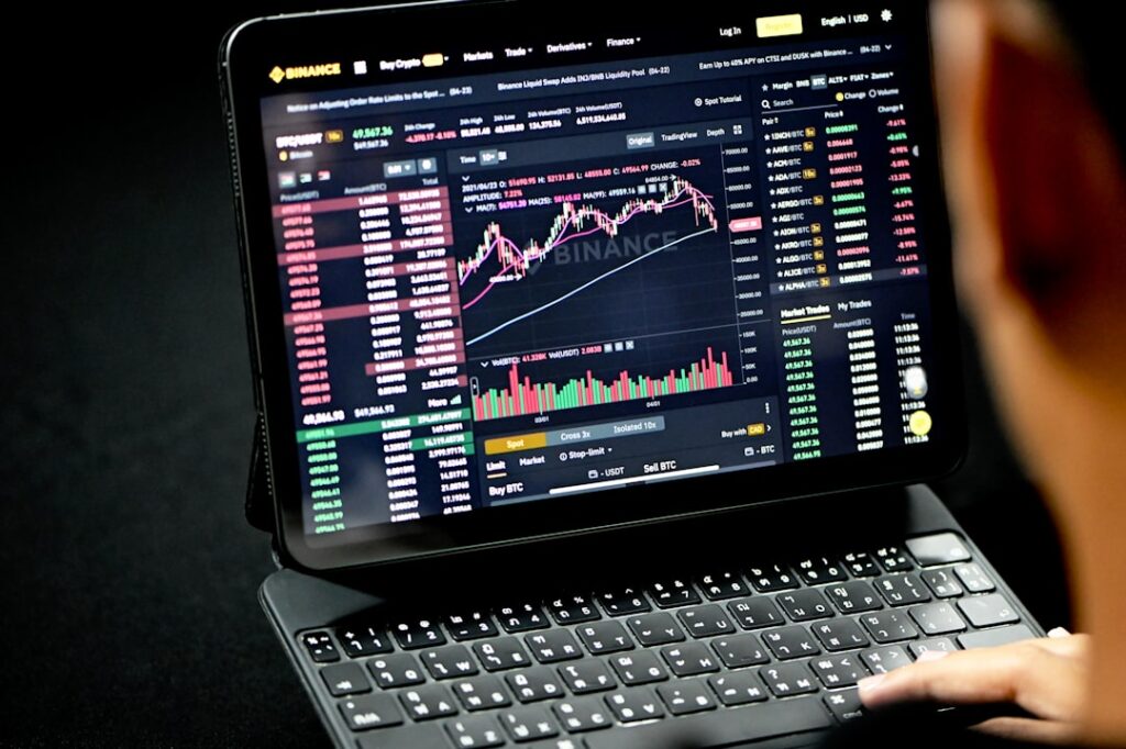 black laptop computer turned on displaying game application
